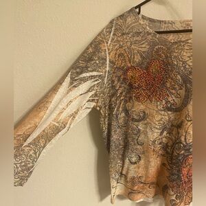 Long sleeve graphic design bedazzled orange shirt